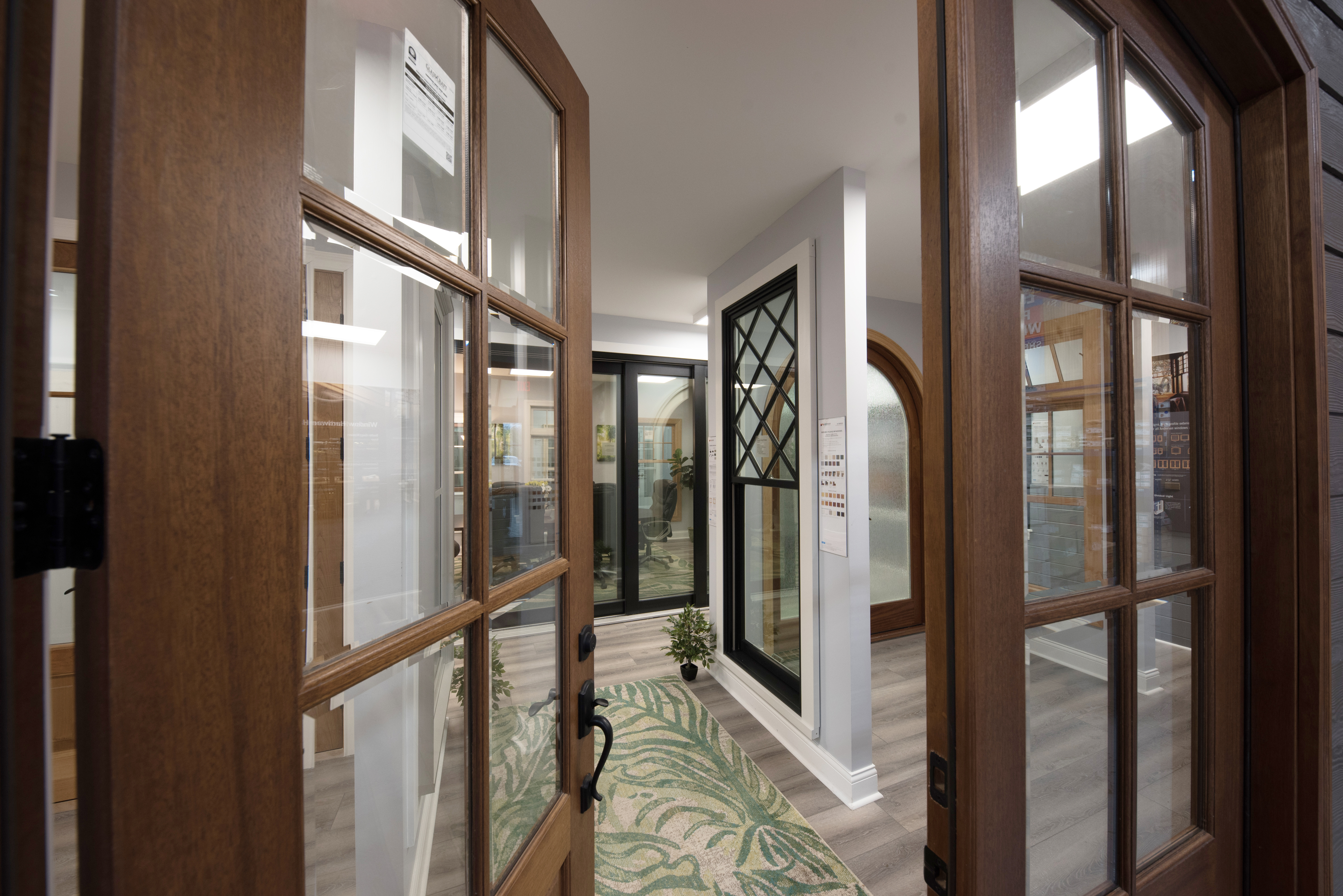 Door open to Louisville Showroom, with window display