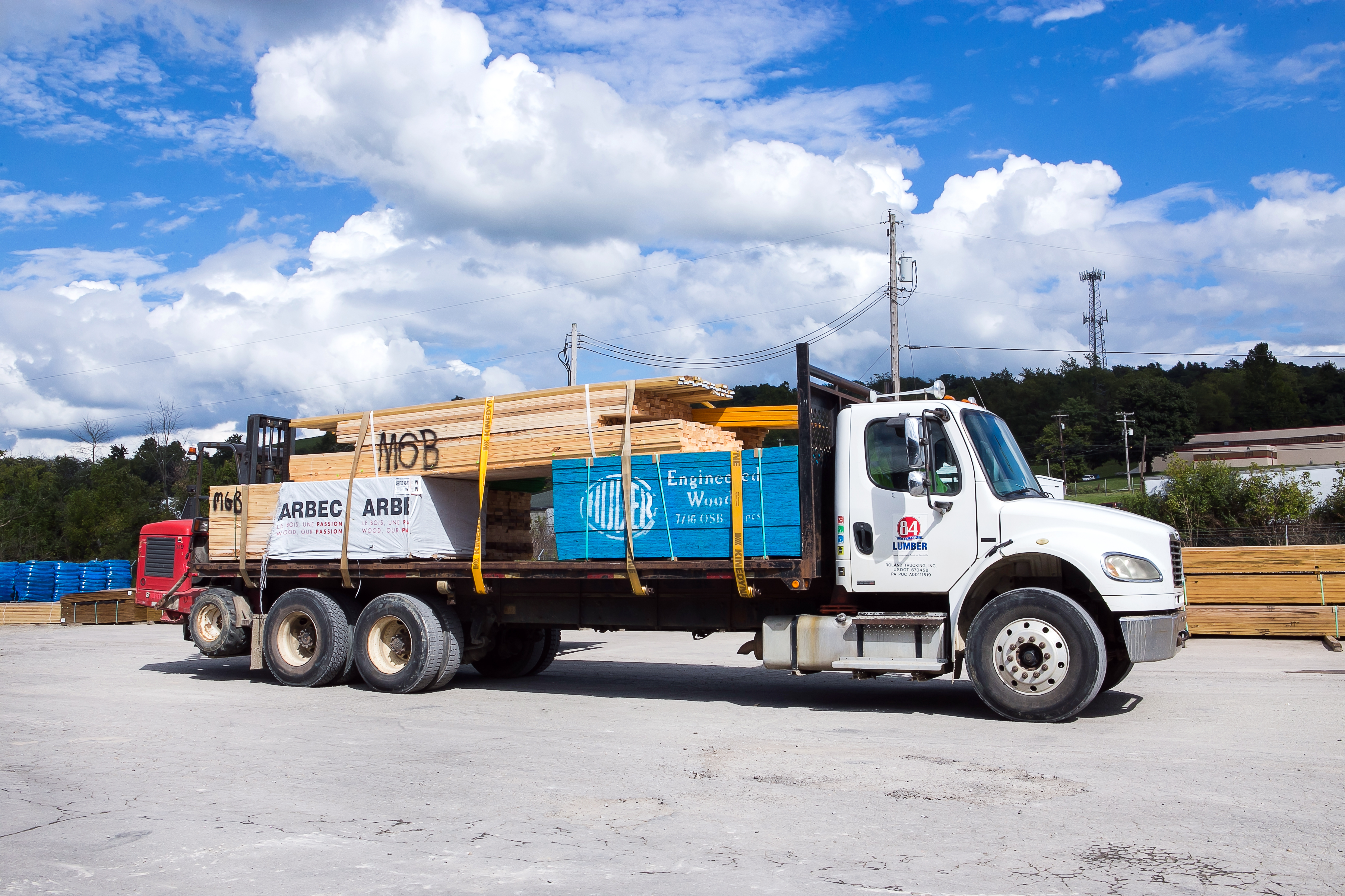 84 Lumber truck hauling Lumber 