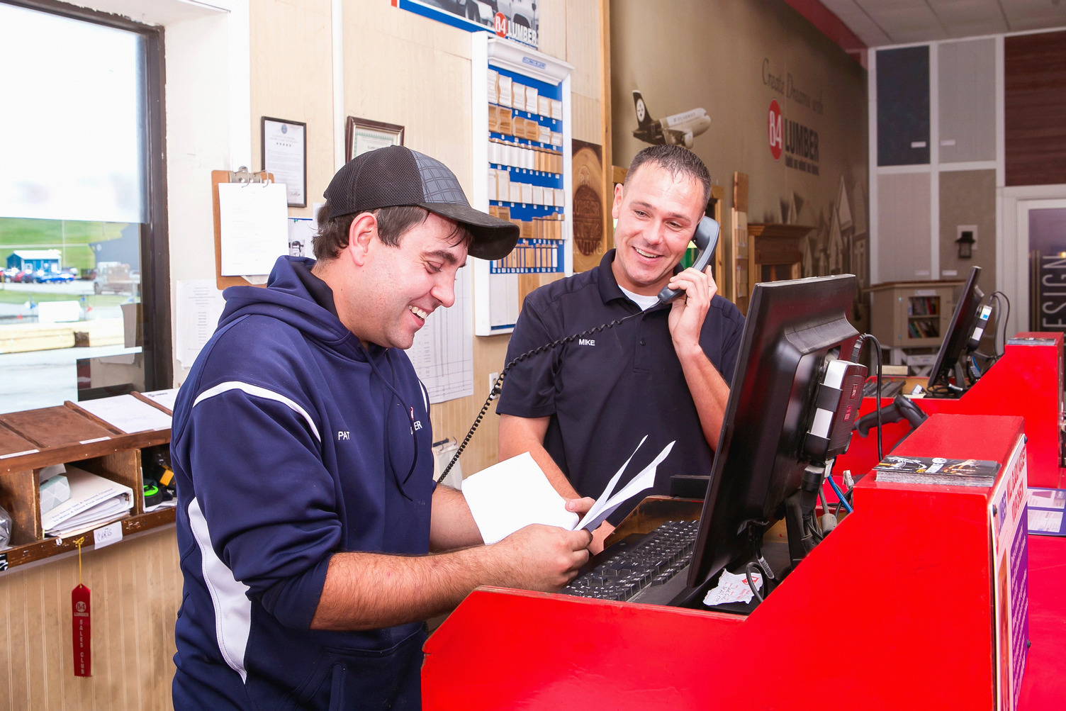 84 Lumber associates at front desk