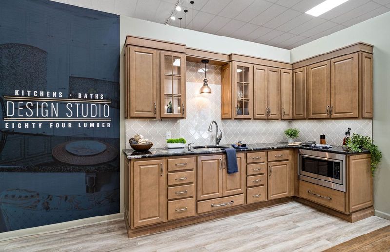 Kitchen display with wooden upper and lower cabinets