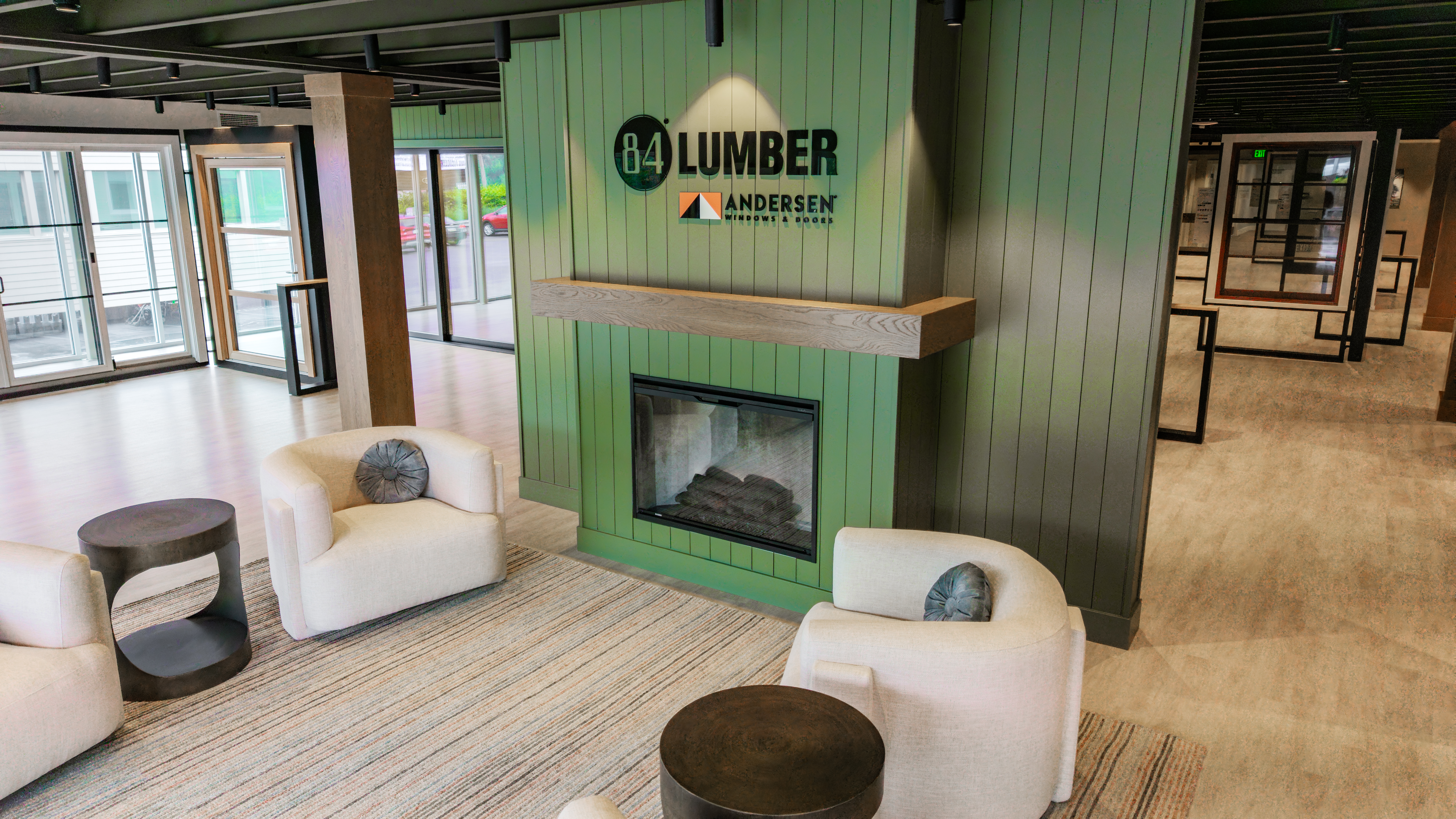 Green fireplace at the entrance of the windows and doors showroom