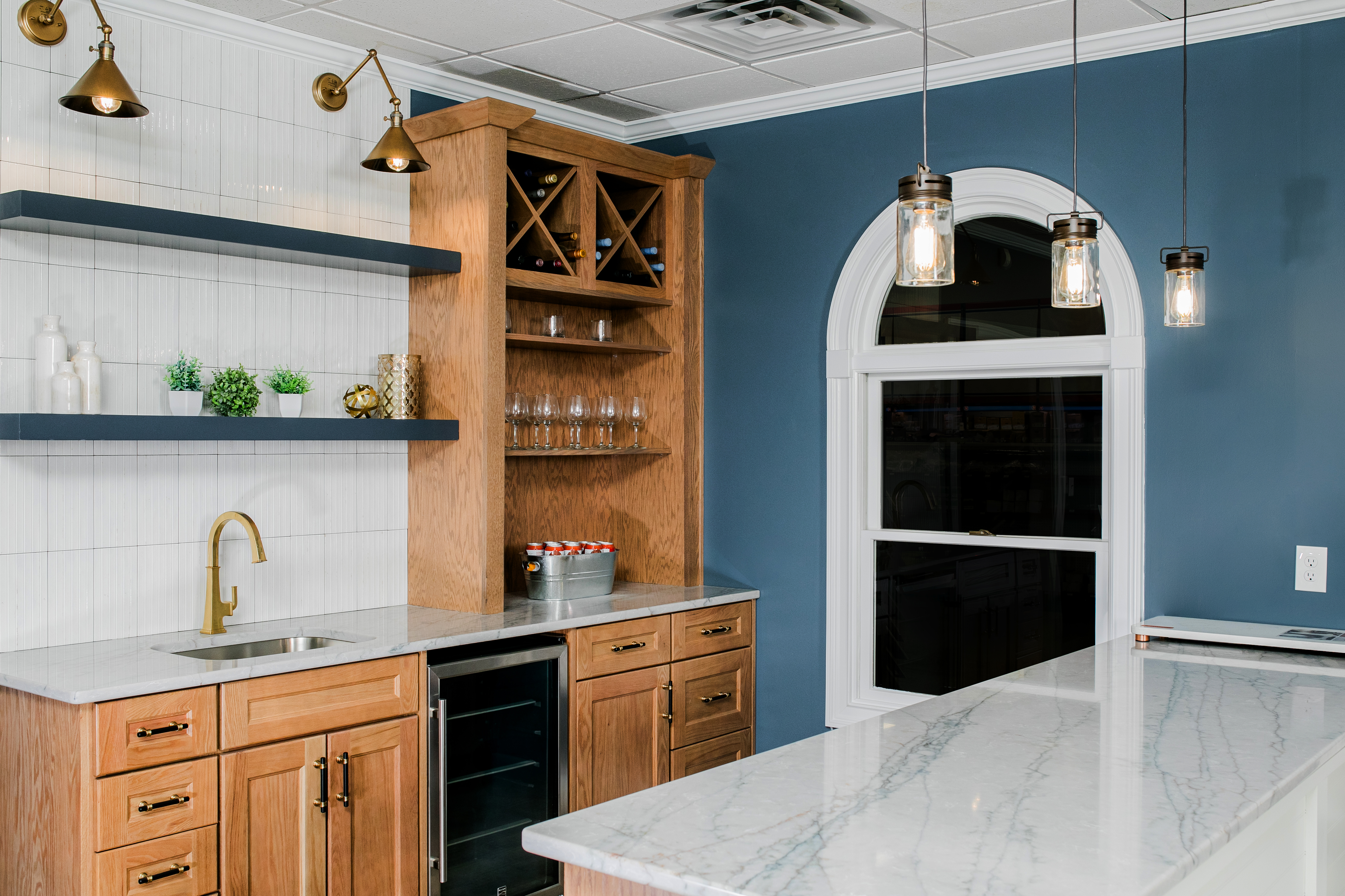 Showroom Display at 84 Lumber of a kitchen with blue accents 
